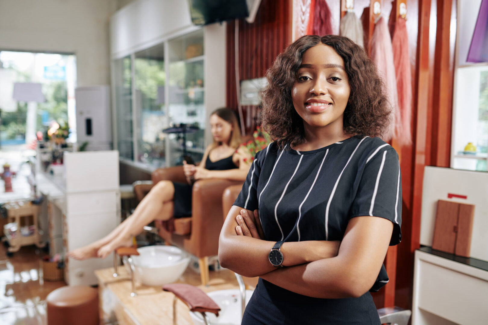 Portrait,Of,Pretty,Young,Manicurist,Smiling,At,Camera,,Her,Client